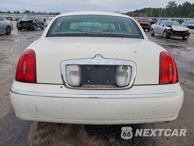 Zdjęcie 6 z 12 samochodu: 1999 LINCOLN TOWN CAR VIN:1LNHM82W7XY614042 - miniatura