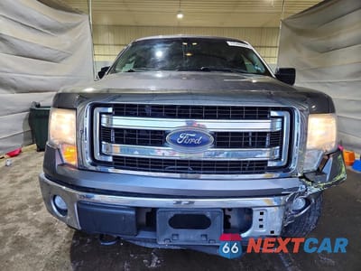 Piąte zdjęcie samochodu w środku: 2014 FORD F150 SUPERCREW VIN:1FTFW1EF1EFA77377 - miniatura