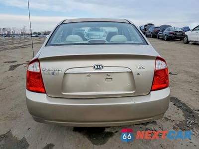 Zdjęcie 6 z 13 samochodu: 2004 KIA SPECTRA LX VIN:KNAFE121345058584 - miniatura