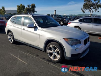 Czwarte zdjęcie samochodu z boku: 2013 BMW X1 XDRIVE35I VIN:WBAVM5C52DVV91159 - miniatura