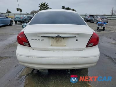 Zdjęcie 6 z 13 samochodu: 2000 FORD TAURUS LX VIN:1FAFP5221YA243068 - miniatura