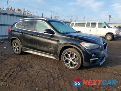 Czwarte zdjęcie samochodu z boku: 2017 BMW X1 XDRIVE28I VIN:WBXHT3C3XH5F80542 - miniatura