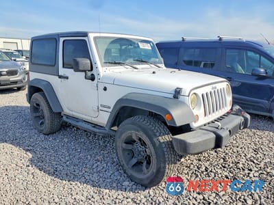 Czwarte zdjęcie samochodu z boku: 2011 JEEP WRANGLER VIN:1J4AA2D11BL607875 - miniatura