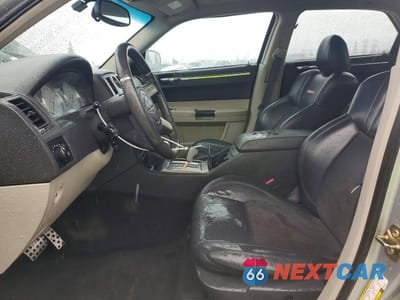 Zdjęcie 7 z 11 samochodu: 2006 CHRYSLER 300C SRT-8 VIN:2C3LA73W66H388752 - miniatura