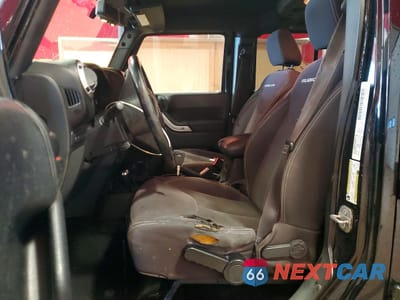 Zdjęcie 7 z 13 samochodu: 2014 JEEP WRANGLER UNLIMITED RUBICON VIN:1C4BJWFG0EL239759 - miniatura