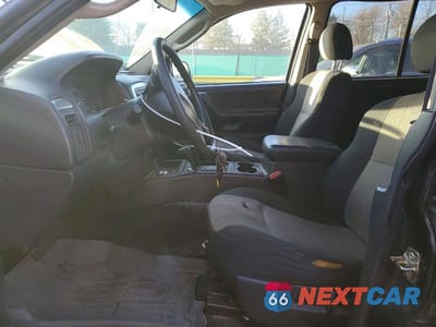 Zdjęcie 7 z 12 samochodu: 2004 JEEP GRAND CHEROKEE LAREDO VIN:1J4GW48S24C279153 - miniatura