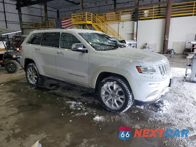 Czwarte zdjęcie samochodu z boku: 2015 JEEP GRAND CHEROKEE SUMMIT VIN:1C4RJFJM2FC797299 - miniatura