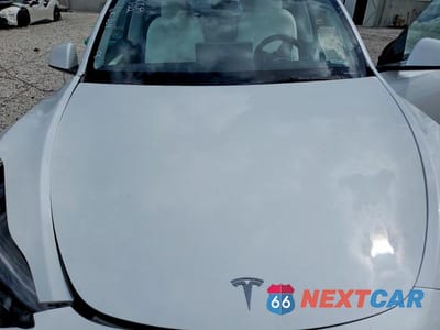 Zdjęcie 11 z 12 samochodu: 2023 TESLA MODEL Y VIN:7SAYGDEE6PF630324 - miniatura
