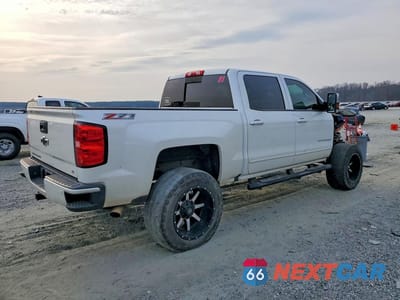 Trzecie zdjęcie samochodu z tyłu: 2016 CHEVROLET SILVERADO K1500 LT VIN:3GCUKREC4GG248793 - miniatura
