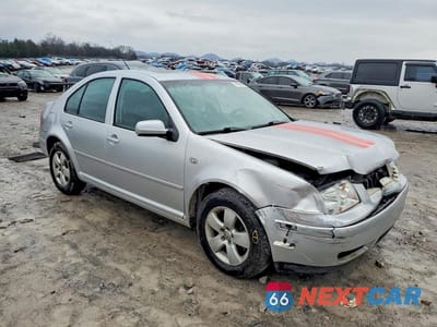 Czwarte zdjęcie samochodu z boku: 2004 VOLKSWAGEN JETTA GLS VIN:3VWSK69M44M054543 - miniatura