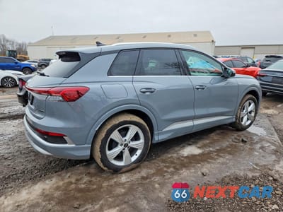 Trzecie zdjęcie samochodu z tyłu: 2023 AUDI Q4 E-TRON PREMIUM VIN:WA1K2BFZ3PP058488 - miniatura