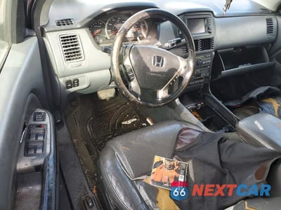 Zdjęcie 8 z 12 samochodu: 2003 HONDA PILOT EXL VIN:2HKYF18703H525351 - miniatura