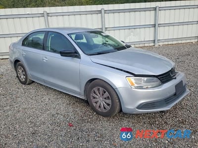 Czwarte zdjęcie samochodu z boku: 2014 VOLKSWAGEN JETTA BASE VIN:3VW2K7AJ0EM254716 - miniatura