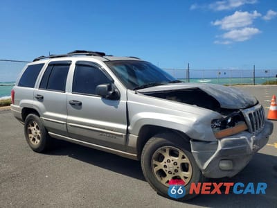 Czwarte zdjęcie samochodu z boku: 2000 JEEP GRAND CHEROKEE LAREDO VIN:1J4G248S7YC134501 - miniatura