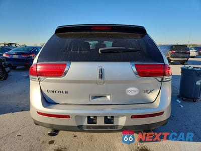 Zdjęcie 6 z 12 samochodu: 2013 LINCOLN MKX VIN:2LMDJ6JK2DBL04730 - miniatura