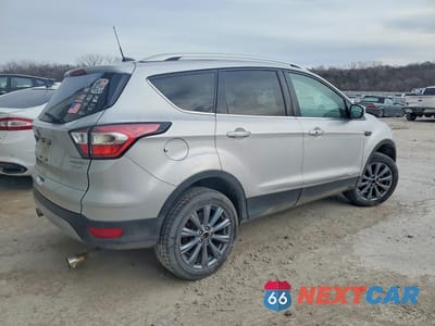 Trzecie zdjęcie samochodu z tyłu: 2017 FORD ESCAPE TITANIUM VIN:1FMCU0JDXHUE57577 - miniatura