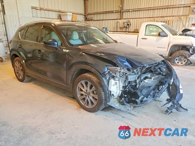 Czwarte zdjęcie samochodu z boku: 2019 MAZDA CX-5 GRAND TOURING RESERVE VIN:JM3KFBDY7K0641319 - miniatura