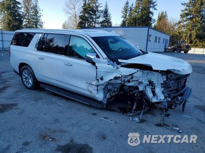 Czwarte zdjęcie samochodu z boku: 2021 CHEVROLET SUBURBAN K1500 PREMIER VIN:1GNSKFKD6MR218779 - miniatura