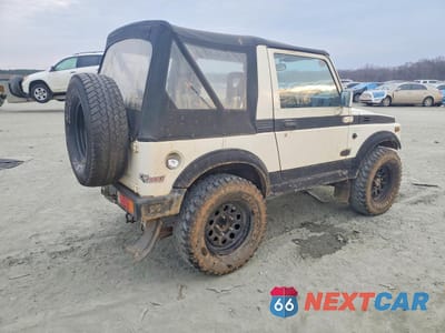 Trzecie zdjęcie samochodu z tyłu: 1986 SUZUKI SAMURAI VIN:JS3JC51C8G4125415 - miniatura