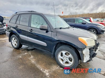 Czwarte zdjęcie samochodu z boku: 2002 TOYOTA RAV4 BASE VIN:JTEGH20VX20058890 - miniatura