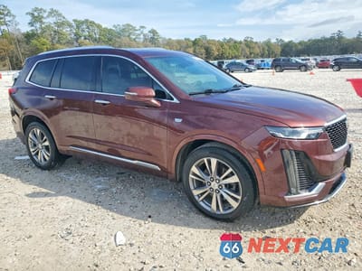 Czwarte zdjęcie samochodu z boku: 2023 CADILLAC XT6 PREMIUM LUXURY VIN:1GYKPCRS2PZ163596 - miniatura