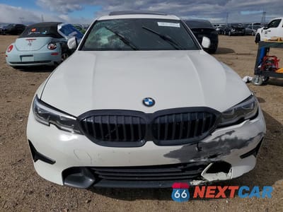 Piąte zdjęcie samochodu w środku: 2021 BMW 330I VIN:3MW5R1J08M8B84080 - miniatura