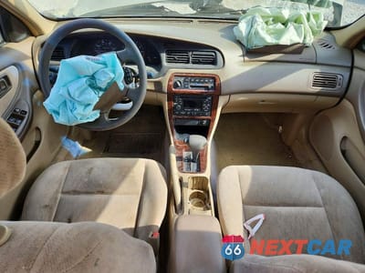 Zdjęcie 8 z 11 samochodu: 1999 NISSAN ALTIMA XE VIN:1N4DL01DXXC240570 - miniatura