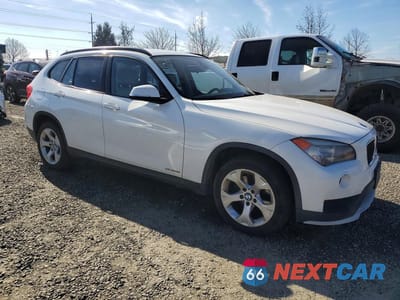 Czwarte zdjęcie samochodu z boku: 2015 BMW X1 SDRIVE28I VIN:WBAVM1C5XFVW58747 - miniatura