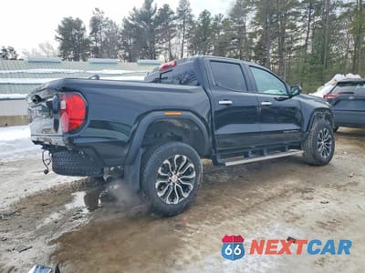 Trzecie zdjęcie samochodu z tyłu: 2024 GMC CANYON DENALI VIN:1GTP6FEK7R1240700 - miniatura