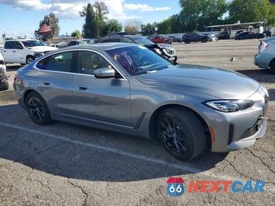 Czwarte zdjęcie samochodu z boku: 2024 BMW I4 EDRIVE 35 VIN:WBY43AW05RFS84305 - miniatura