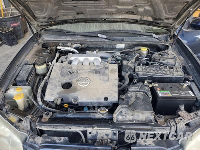 Zdjęcie 11 z 12 samochodu: 2003 NISSAN MAXIMA GXE VIN:JN1DA31D73T518498 - miniatura