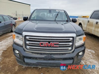 Piąte zdjęcie samochodu w środku: 2017 GMC CANYON SLE VIN:1GTG6CEN0H1264652 - miniatura