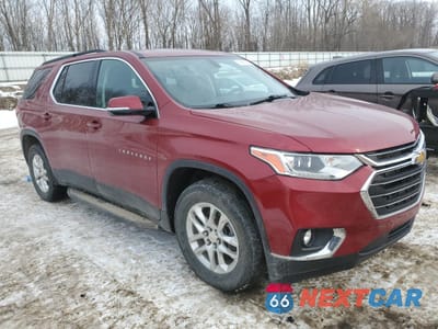 Czwarte zdjęcie samochodu z boku: 2020 CHEVROLET TRAVERSE LT VIN:1GNEVGKWXLJ261157 - miniatura