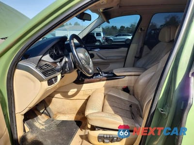 Zdjęcie 7 z 13 samochodu: 2014 BMW X5 SDRIVE35I VIN:5UXKR2C59E0H31603 - miniatura