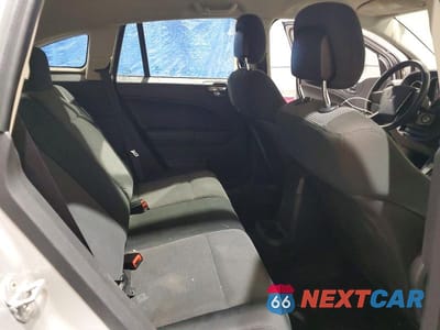 Zdjęcie 11 z 12 samochodu: 2011 DODGE CALIBER MAINSTREET VIN:1B3CB3HA8BD148111 - miniatura