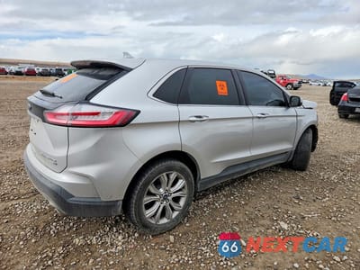 Trzecie zdjęcie samochodu z tyłu: 2019 FORD EDGE TITANIUM VIN:2FMPK4K98KBB54979 - miniatura