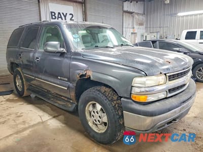 Czwarte zdjęcie samochodu z boku: 2003 CHEVROLET TAHOE K1500 VIN:1GNEK13Z03J315547 - miniatura