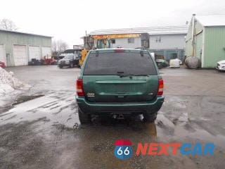 Zdjęcie 6 z 12 samochodu: 1999 JEEP GRAND CHEROKEE LIMITED VIN:1J4GW68N3XC639363 - miniatura