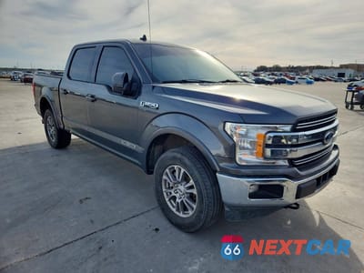 Czwarte zdjęcie samochodu z boku: 2019 FORD F150 LARIAT 4WD VIN:1FTFW1E12KFC64739 - miniatura