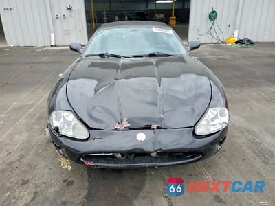 Piąte zdjęcie samochodu w środku: 1999 JAGUAR XK8 VIN:SAJGX2041XC035598 - miniatura