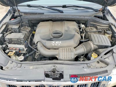 Zdjęcie 12 z 13 samochodu: 2012 JEEP GRAND CHEROKEE VIN:1C4RJEBG4CC306908 - miniatura