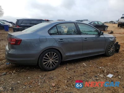 Trzecie zdjęcie samochodu z tyłu: 2017 VOLKSWAGEN JETTA SPORT VIN:3VWD17AJ8HM305752 - miniatura