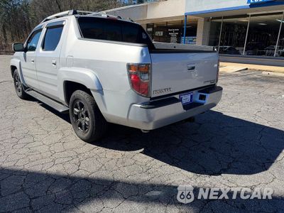 Trzecie zdjęcie samochodu z tyłu: 2006 HONDA RIDGELINE RTL VIN:2HJYK16526H515927 - miniatura