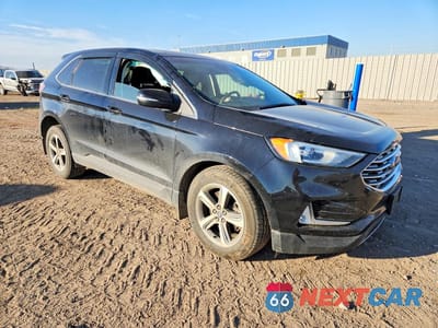 Czwarte zdjęcie samochodu z boku: 2019 FORD EDGE SEL VIN:2FMPK4J9XKBC41073 - miniatura