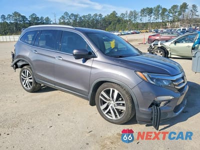 Czwarte zdjęcie samochodu z boku: 2017 HONDA PILOT TOURING VIN:5FNYF5H95HB025393 - miniatura