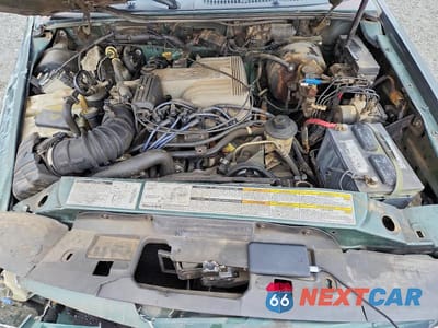 Zdjęcie 12 z 13 samochodu: 1999 FORD EXPLORER VIN:1FMZU35P4XZB35972 - miniatura