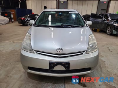 Piąte zdjęcie samochodu w środku: 2005 TOYOTA PRIUS VIN:JTDKB20U057057928 - miniatura