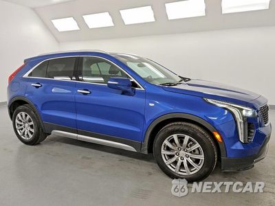Czwarte zdjęcie samochodu z boku: 2023 CADILLAC XT4 PREMIUM LUXURY VIN:1GYFZCR47PF147411 - miniatura