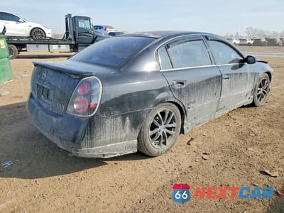 Trzecie zdjęcie samochodu z tyłu: 2002 NISSAN ALTIMA 2.5 VIN:1N4AL11D52C112822 - miniatura