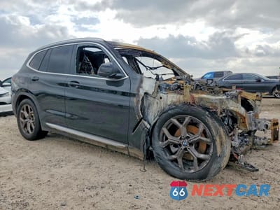 Czwarte zdjęcie samochodu z boku: 2022 BMW X3 SDRIVE30I VIN:5UX43DP01N9K34316 - miniatura